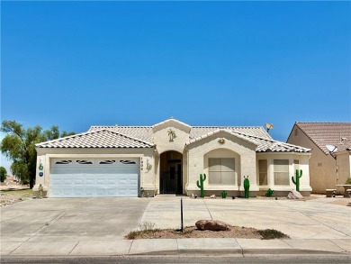 Situated gracefully between the 11th and 12th holes of the on Desert Lakes Golf Course in Arizona - for sale on GolfHomes.com, golf home, golf lot