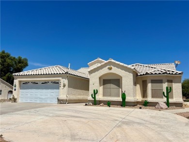 Situated gracefully between the 11th and 12th holes of the on Desert Lakes Golf Course in Arizona - for sale on GolfHomes.com, golf home, golf lot