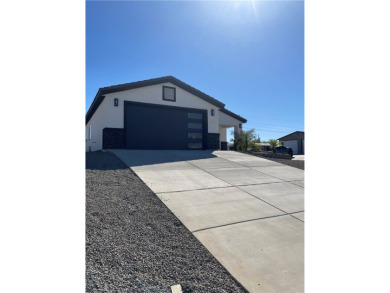 Stunning New Construction 3-bedroon 2- bath home on a large on Chaparral Golf and Country Club in Arizona - for sale on GolfHomes.com, golf home, golf lot