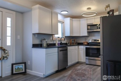 NO HOA! NO METRO DISTRICT! Welcome to this beautifully updated on Greeley Country Club in Colorado - for sale on GolfHomes.com, golf home, golf lot