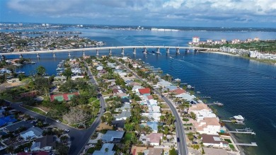 Enjoy island living in the beautiful community of Vina Del Mar! on Isla Del Sol Yacht and Country Club in Florida - for sale on GolfHomes.com, golf home, golf lot