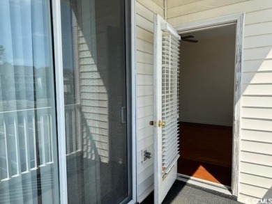 WELCOME TO THIS CHARMING, CONVENIENTLY LOCATED CONDO IN FAIRWAYS on World Tour Golf Links in South Carolina - for sale on GolfHomes.com, golf home, golf lot