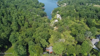 Stunning Log Cabin style Retreat on Norris Lake - Community on The Greens at Deerfield in Tennessee - for sale on GolfHomes.com, golf home, golf lot