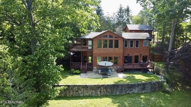 Stunning Log Cabin style Retreat on Norris Lake - Community on The Greens at Deerfield in Tennessee - for sale on GolfHomes.com, golf home, golf lot