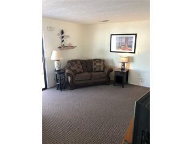 Experience the freedom of NO LOT Rent.

Welcome to your dream on Pelican Pointe Golf and Country Club in Florida - for sale on GolfHomes.com, golf home, golf lot