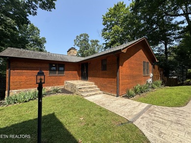 Stunning Log Cabin style Retreat on Norris Lake - Community on The Greens at Deerfield in Tennessee - for sale on GolfHomes.com, golf home, golf lot