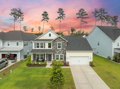 Live the Lake Life in Cane Bay! This stunning 5-bedroom, 3 on Cypress Point Par 3 in South Carolina - for sale on GolfHomes.com, golf home, golf lot