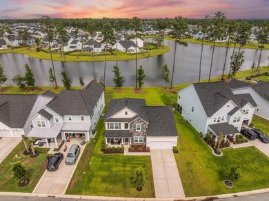 Live the Lake Life in Cane Bay! This stunning 5-bedroom, 3 on Cypress Point Par 3 in South Carolina - for sale on GolfHomes.com, golf home, golf lot