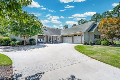 Welcome to your dream home, perfectly nestled on nearly an acre on The Patriot Golf Club At Grand Harbor in South Carolina - for sale on GolfHomes.com, golf home, golf lot