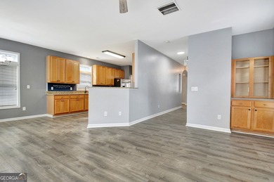 Welcome Home to this beautifully maintained, spacious retreat on Summergrove Golf Club in Georgia - for sale on GolfHomes.com, golf home, golf lot