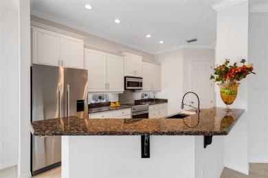 THIS POPULAR DORCHESTER plan home in the Laurel Glen community on Grasslands Golf and Country Club in Florida - for sale on GolfHomes.com, golf home, golf lot