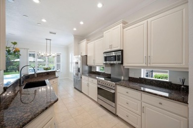 THIS POPULAR DORCHESTER plan home in the Laurel Glen community on Grasslands Golf and Country Club in Florida - for sale on GolfHomes.com, golf home, golf lot
