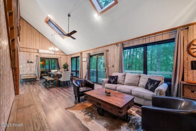 Discover the perfect blend of comfort and serenity in this on The Hideout Golf in Pennsylvania - for sale on GolfHomes.com, golf home, golf lot
