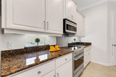 THIS POPULAR DORCHESTER plan home in the Laurel Glen community on Grasslands Golf and Country Club in Florida - for sale on GolfHomes.com, golf home, golf lot