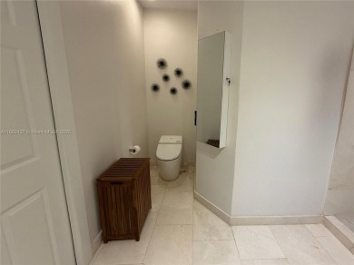 Welcome to this elegant first-floor condominium at The Legends on Weston Hills Country Club in Florida - for sale on GolfHomes.com, golf home, golf lot