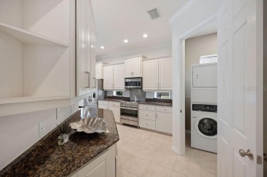 THIS POPULAR DORCHESTER plan home in the Laurel Glen community on Grasslands Golf and Country Club in Florida - for sale on GolfHomes.com, golf home, golf lot