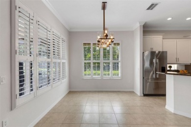 THIS POPULAR DORCHESTER plan home in the Laurel Glen community on Grasslands Golf and Country Club in Florida - for sale on GolfHomes.com, golf home, golf lot