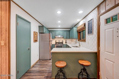 Discover the perfect blend of comfort and serenity in this on The Hideout Golf in Pennsylvania - for sale on GolfHomes.com, golf home, golf lot