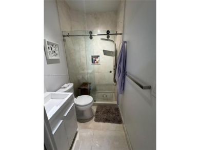 Welcome to this elegant first-floor condominium at The Legends on Weston Hills Country Club in Florida - for sale on GolfHomes.com, golf home, golf lot