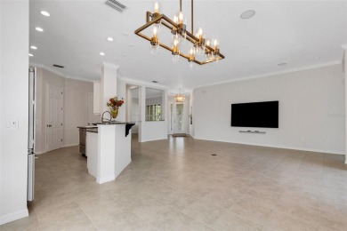 THIS POPULAR DORCHESTER plan home in the Laurel Glen community on Grasslands Golf and Country Club in Florida - for sale on GolfHomes.com, golf home, golf lot