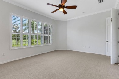 THIS POPULAR DORCHESTER plan home in the Laurel Glen community on Grasslands Golf and Country Club in Florida - for sale on GolfHomes.com, golf home, golf lot