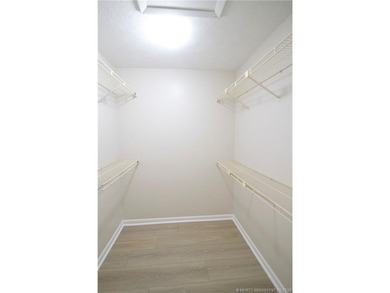 Discover the active golfing community of Eaglewood in Hobe Sound on Eagle Wood Golf Course in Florida - for sale on GolfHomes.com, golf home, golf lot