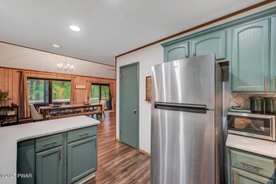 Discover the perfect blend of comfort and serenity in this on The Hideout Golf in Pennsylvania - for sale on GolfHomes.com, golf home, golf lot