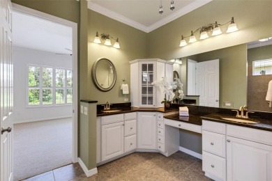 THIS POPULAR DORCHESTER plan home in the Laurel Glen community on Grasslands Golf and Country Club in Florida - for sale on GolfHomes.com, golf home, golf lot