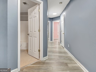 Welcome Home to this beautifully maintained, spacious retreat on Summergrove Golf Club in Georgia - for sale on GolfHomes.com, golf home, golf lot