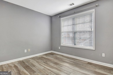 Welcome Home to this beautifully maintained, spacious retreat on Summergrove Golf Club in Georgia - for sale on GolfHomes.com, golf home, golf lot