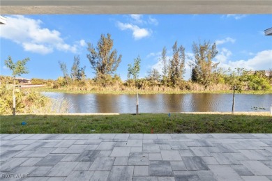 WATERFRONT NEW CONSTRUCTION HOME comes loaded with upgrades on Coral Oaks Golf Course in Florida - for sale on GolfHomes.com, golf home, golf lot