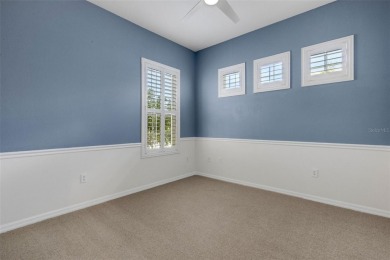 THIS POPULAR DORCHESTER plan home in the Laurel Glen community on Grasslands Golf and Country Club in Florida - for sale on GolfHomes.com, golf home, golf lot