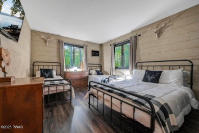 Discover the perfect blend of comfort and serenity in this on The Hideout Golf in Pennsylvania - for sale on GolfHomes.com, golf home, golf lot