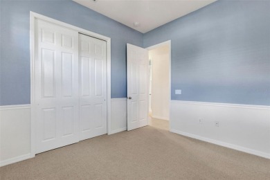 THIS POPULAR DORCHESTER plan home in the Laurel Glen community on Grasslands Golf and Country Club in Florida - for sale on GolfHomes.com, golf home, golf lot