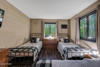 Discover the perfect blend of comfort and serenity in this on The Hideout Golf in Pennsylvania - for sale on GolfHomes.com, golf home, golf lot