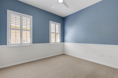 THIS POPULAR DORCHESTER plan home in the Laurel Glen community on Grasslands Golf and Country Club in Florida - for sale on GolfHomes.com, golf home, golf lot