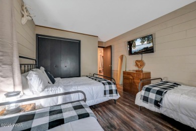 Discover the perfect blend of comfort and serenity in this on The Hideout Golf in Pennsylvania - for sale on GolfHomes.com, golf home, golf lot