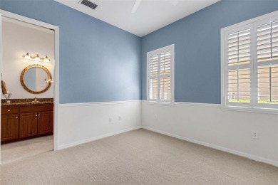 THIS POPULAR DORCHESTER plan home in the Laurel Glen community on Grasslands Golf and Country Club in Florida - for sale on GolfHomes.com, golf home, golf lot