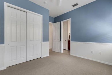 THIS POPULAR DORCHESTER plan home in the Laurel Glen community on Grasslands Golf and Country Club in Florida - for sale on GolfHomes.com, golf home, golf lot