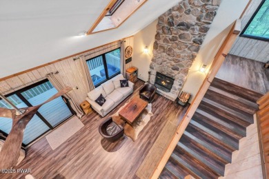 Discover the perfect blend of comfort and serenity in this on The Hideout Golf in Pennsylvania - for sale on GolfHomes.com, golf home, golf lot