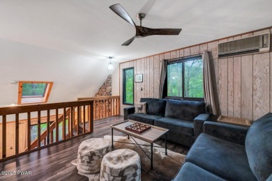 Discover the perfect blend of comfort and serenity in this on The Hideout Golf in Pennsylvania - for sale on GolfHomes.com, golf home, golf lot