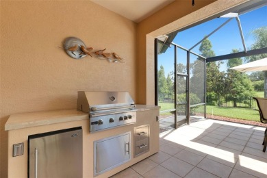 THIS POPULAR DORCHESTER plan home in the Laurel Glen community on Grasslands Golf and Country Club in Florida - for sale on GolfHomes.com, golf home, golf lot