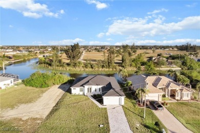 WATERFRONT NEW CONSTRUCTION HOME comes loaded with upgrades on Coral Oaks Golf Course in Florida - for sale on GolfHomes.com, golf home, golf lot