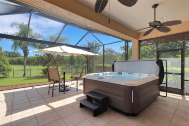 THIS POPULAR DORCHESTER plan home in the Laurel Glen community on Grasslands Golf and Country Club in Florida - for sale on GolfHomes.com, golf home, golf lot
