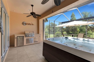 THIS POPULAR DORCHESTER plan home in the Laurel Glen community on Grasslands Golf and Country Club in Florida - for sale on GolfHomes.com, golf home, golf lot