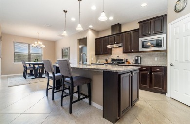 Exceptional Summerwood Model in Del Webb Orlando!  Meticulously on Ridgewood Lakes Golf and Country Club in Florida - for sale on GolfHomes.com, golf home, golf lot