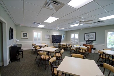 Discover the active golfing community of Eaglewood in Hobe Sound on Eagle Wood Golf Course in Florida - for sale on GolfHomes.com, golf home, golf lot