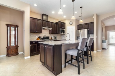 Exceptional Summerwood Model in Del Webb Orlando!  Meticulously on Ridgewood Lakes Golf and Country Club in Florida - for sale on GolfHomes.com, golf home, golf lot