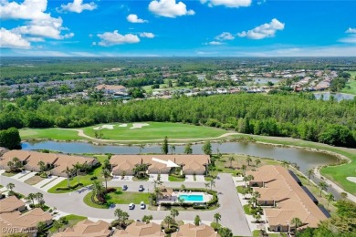 The view from this villa covers the entire 13th hole on Olde Hickory Golf and Country Club in Florida - for sale on GolfHomes.com, golf home, golf lot