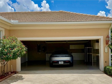 THIS POPULAR DORCHESTER plan home in the Laurel Glen community on Grasslands Golf and Country Club in Florida - for sale on GolfHomes.com, golf home, golf lot